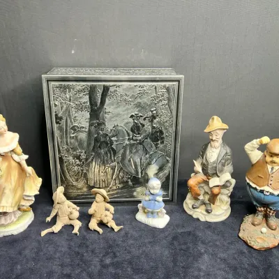Unique Tin Of Decorative Figurines