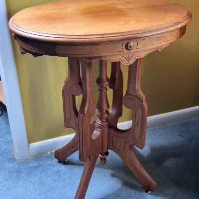 Victorian Walnut Parlor Table On Casters