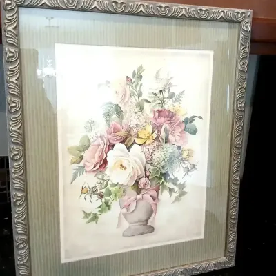 Framed floral art print featuring a bouquet of roses and hydrangeas in an urn, set within a striped mat and ornate metallic frame.