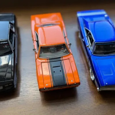Lot of 3 Maisto 1:24 Diecast Muscle Cars - 1969 Charger, 1970 GTX, 1988 Monte Carlo