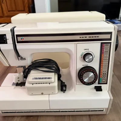 Vintage New Home Heavy-Duty Sewing Machine with Multiple Stitch Patterns, Foot Pedal & Case