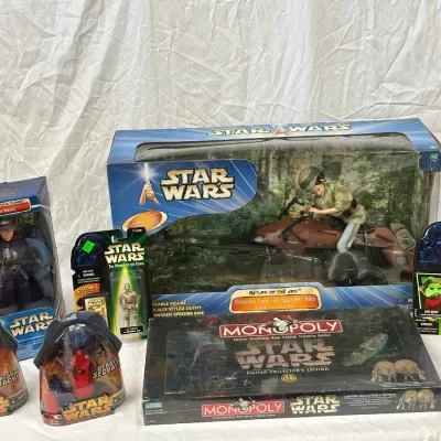 Collection of Star Wars merchandise including Hasbro action figures, a large Princess Leia on Speeder Bike set, and a Star Wars Limited...