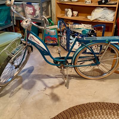 Vintage Hiawatha Strato Chief cruiser bicycle in teal, featuring front headlight, front luggage rack, rear package tray, and original...