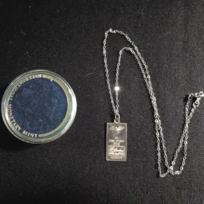 International Monetary Mint .999 Silver Pendant On Chain 1.9g