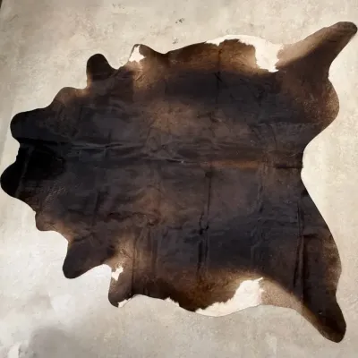 Deep Brown Cow Hide Rug For Rustic Charm 