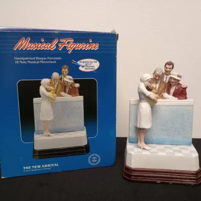 American Art Collectors Inc. Norman Rockwell "The New Arrival" Musical Figurine