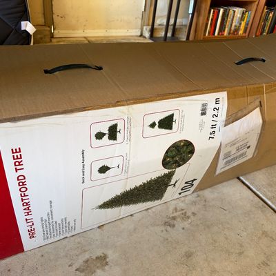 Ashland Christmas 7.5-foot pre-lit Hartford artificial tree in its original cardboard box.