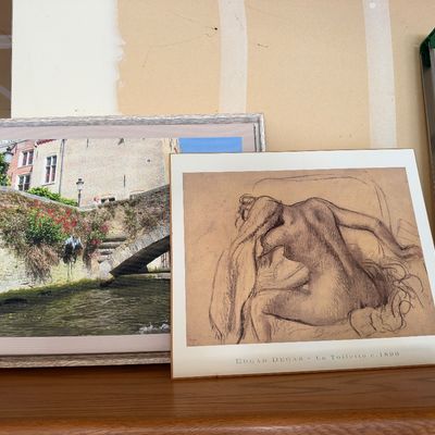 Sale Photo Thumbnail #107: Pair of framed art prints including a photographic print of a European canal and an Edgar Degas print titled "La Toilette c. 1890".