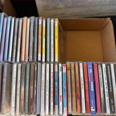 Sale Photo Thumbnail #168: Large collection of compact discs featuring various pop, rock, Christmas, and soundtrack albums from the 1990s and 2000s.