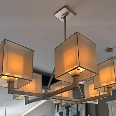 Sale Photo Thumbnail #48: Modern six-light chandelier featuring a brushed metal geometric frame with square frosted glass shades.