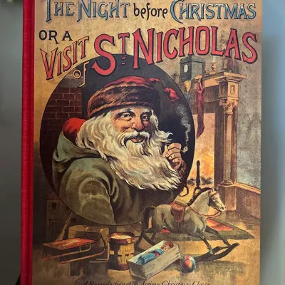 Sale Photo Thumbnail #87: Vintage-style hardcover book titled "The Night Before Christmas or A Visit of St. Nicholas," featuring reproduction antique cover art of Santa Claus and classic toys.
