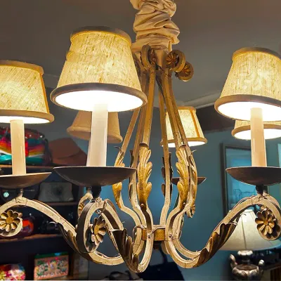 Sale Photo Thumbnail #154: Vintage French Provincial style six-light metal chandelier with gilt leaf and floral details and fabric lampshades.