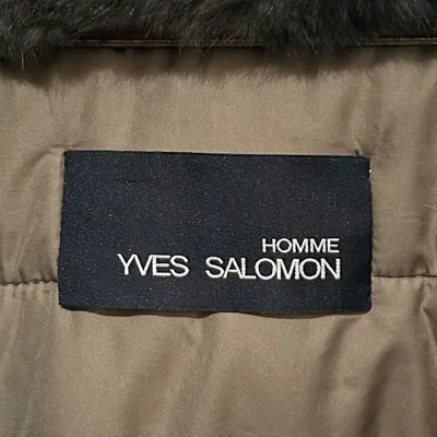 Sale Photo Thumbnail #166: Interior designer label on an Yves Salomon Homme outerwear garment with fur trim.