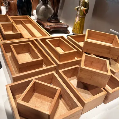 Sale Photo Thumbnail #58: Collection of natural bamboo drawer organizational boxes and trays in various sizes.