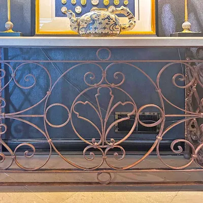 Sale Photo Thumbnail #8: French style wrought iron console table with a stone top and intricate scrollwork details.