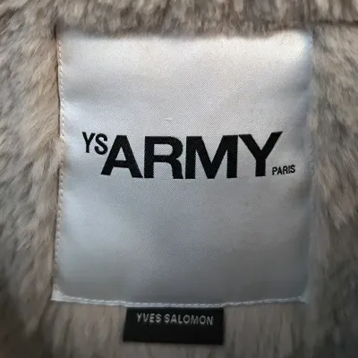 Sale Photo Thumbnail #169: Interior designer label reading 'YS ARMY Paris' by Yves Salomon attached to a plush fur or faux fur lining.