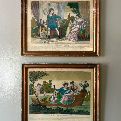 Sale Photo Thumbnail #122: Pair of framed 19th-century French hand-colored engravings titled "La Separation" and "Un An De Mariage," set in matching gilt wooden frames with minor wear.