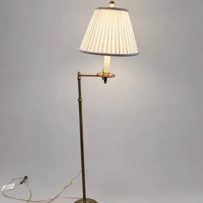 Sale Photo Thumbnail #16: Vintage brass swing-arm floor lamp featuring a pleated fabric shade with blue trim.