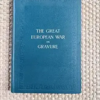 Sale Photo Thumbnail #45: Antique hardcover book, "The Great European War in Gravure," featuring a blue textured cover with embossed border details.