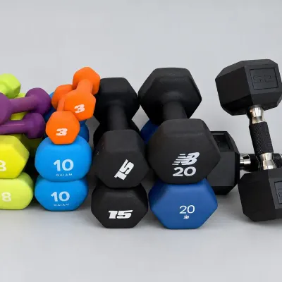 Sale Photo Thumbnail #36: Collection of modern rubber-coated and vinyl hand weights ranging from 2 to 25 pounds, including pairs from Gaiam, New Balance, and Weider.