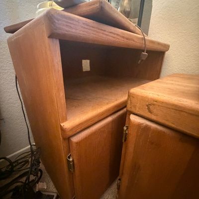 Sale Photo Thumbnail #305: Vintage solid oak nightstands or small media cabinets featuring open upper shelves and single-door lower storage.
