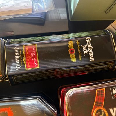 Sale Photo Thumbnail #316: Collectible Gentleman's Jack Daniel's tin, featuring 'The Etiquette of Golf' from The Gentleman's Series.