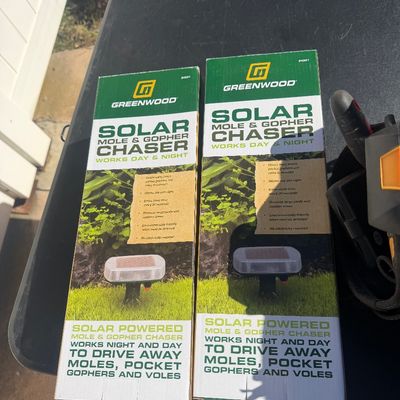 Sale Photo Thumbnail #291: Two boxed Greenwood solar-powered mole and gopher chasers, appearing new in original packaging.