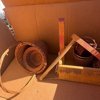 Sale Photo Thumbnail #283: Collection of rustic wicker baskets and wooden caddies packed in a cardboard box.
