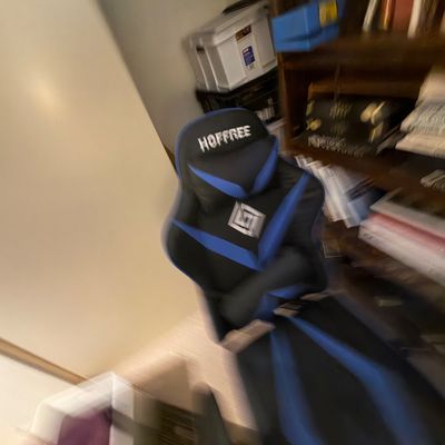 Sale Photo Thumbnail #113: HOFFREE brand black and blue ergonomic gaming chair featuring lumbar support cushion and high backrest design.