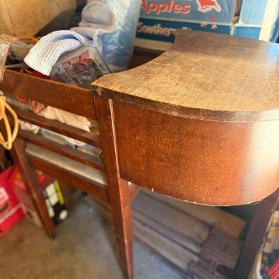 Sale Photo Thumbnail #209: Vintage mid-century wooden telephone chair gossip bench showing significant surface wear and finish loss.