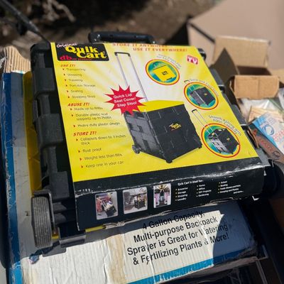 Sale Photo Thumbnail #261: Original Quik Cart heavy-duty plastic collapsible rolling cart, complete with retail packaging sleeve.