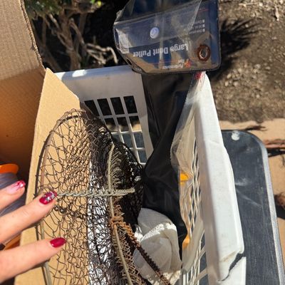 Sale Photo Thumbnail #271: Vintage collapsible wire mesh fish basket paired with a packaged Performance Tool large dent puller kit, displayed inside a plastic laundry crate.