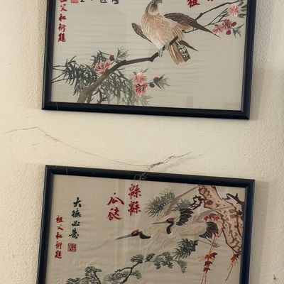 Sale Photo Thumbnail #39: Pair of framed Chinese silk embroidery artworks depicting birds among branches, with calligraphic text and red seal stamps, presented in simple black frames.