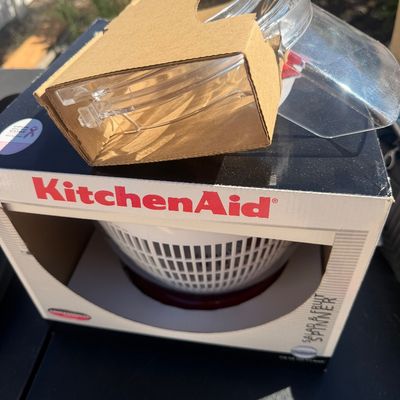 Sale Photo Thumbnail #280: KitchenAid salad and fruit spinner attachment, unused in its original retail packaging.