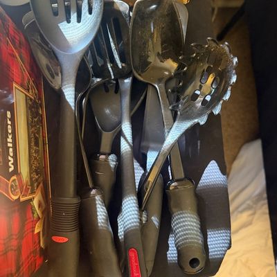Sale Photo Thumbnail #313: Assortment of black nylon cooking utensils, including brands like OXO Good Grips and Good Cook.