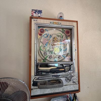 Sale Photo Thumbnail #95: Vintage Nishijin mechanical pachinko game machine mounted in a wooden wall cabinet, circa 1970s.