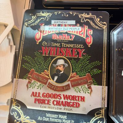 Sale Photo Thumbnail #318: Vintage Jack Daniel's Old No. 7 Tennessee Whiskey decorative collectible tin container, featuring vintage branding and a portrait of Jack Daniel.