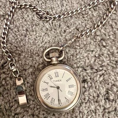 Sale Photo Thumbnail #105: Vintage silver tone Timex watch 