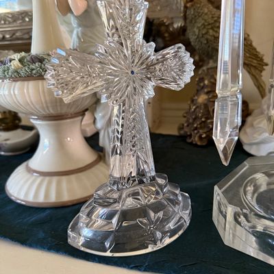 Sale Photo Thumbnail #34: Intricately cut clear lead crystal standing cross featuring starburst and pinwheel motifs on a pedestal base.