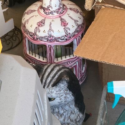 Sale Photo Thumbnail #99: Vintage ceramic birdcage lantern with painted pink floral details, displayed alongside a painted owl figurine.