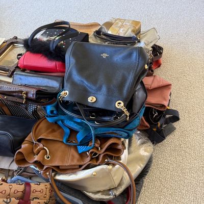 Sale Photo Thumbnail #21: Large pile of assorted leather and fabric designer handbags, including pieces from Coach and Etienne Aigner.