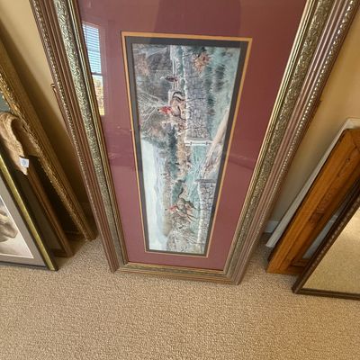 Sale Photo Thumbnail #174: Framed traditional equestrian print depicting a fox hunt scene, double-matted in burgundy and set within an ornate gilded frame.