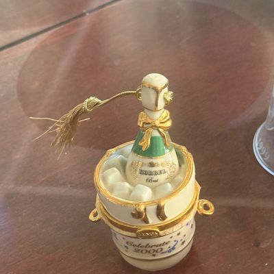 Sale Photo Thumbnail #118: Lenox porcelain champagne bucket trinket box, 'Celebrate 2000' edition featuring a Korbel Brut bottle in ice with gold accents.