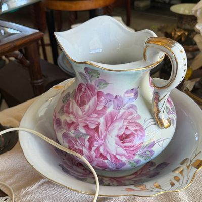 Sale Photo Thumbnail #63: Vintage ceramic wash basin and pitcher set decorated with hand-painted pink roses and gilded trim details.