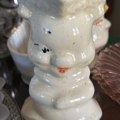 Sale Photo Thumbnail #55: Vintage off-white ceramic bunny rabbit pitcher showing age-related crazing and minor paint wear.