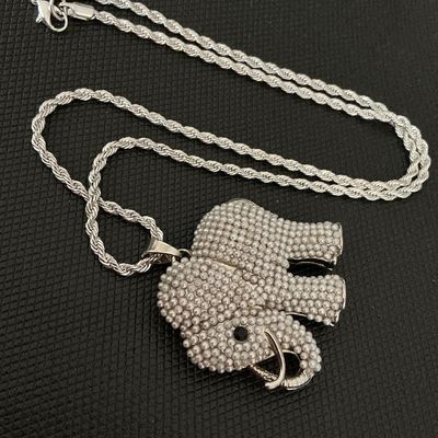 Sale Photo Thumbnail #171: Silver-tone rope chain necklace featuring a detailed elephant pendant encrusted with faux mini pearls and a dark rhinestone eye. Includes a lobster claw clasp closure. Good condition with no missing stones visible.