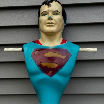 Sale Photo Thumbnail #105: Vintage molded plastic Superman spring horse or kiddie ride bust featuring side handle grips and classic painted superhero detailing.
