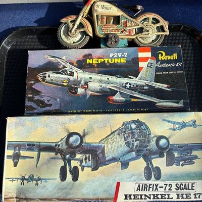 Vintage tin litho friction motorcycle toy alongside vintage boxed Revell Lockheed P2V-7 Neptune and Airfix Heinkel He 177 model airplane...