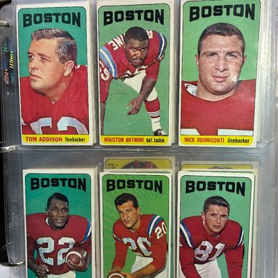 Sale Photo Thumbnail #94: Six vintage 1965 Topps Boston Patriots football trading cards housed in a plastic binder sleeve, featuring players Tom Addison, Houston Antwine, Nick Buoniconti, Ron Burton, Gino Cappelletti, and Jim Colclough.