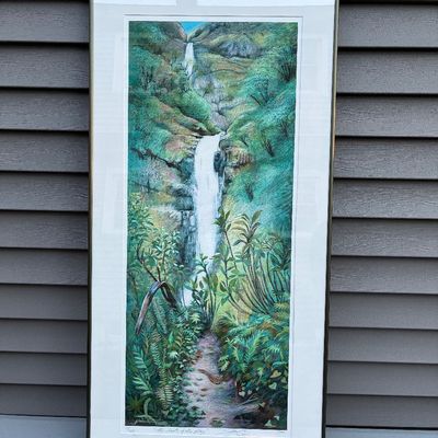 Sale Photo Thumbnail #80: Framed limited-edition art print titled "The Secret of the Valley," depicting a lush waterfall scene, pencil-signed and numbered along the bottom margin.